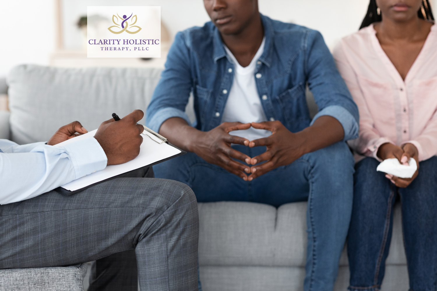 A couples therapy session at Clarity Holistic Therapy, featuring a professional therapist guiding a couple through counseling, emphasizing support, communication, and relationship healing in a comfortable setting.